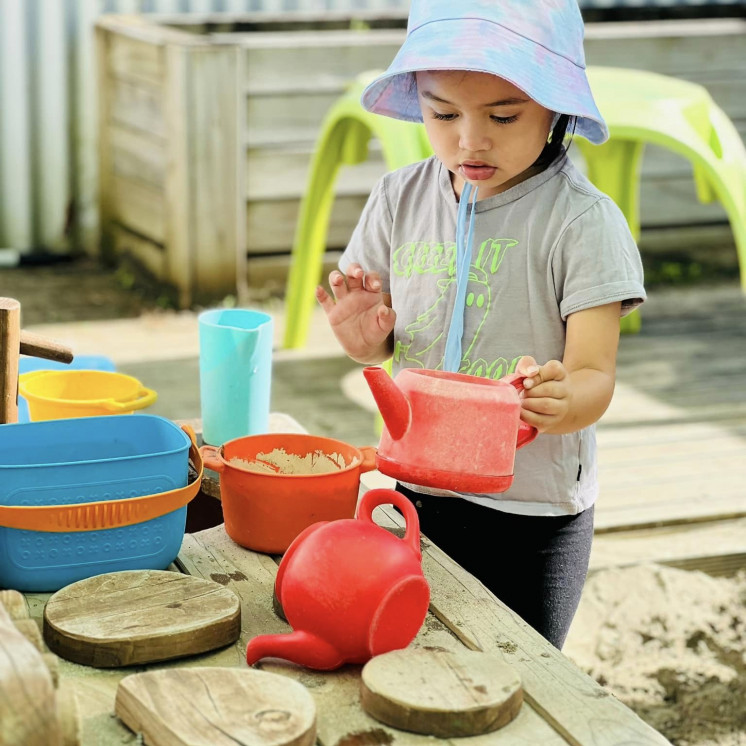 Busy Bees Alfriston Road sandpit imagination play