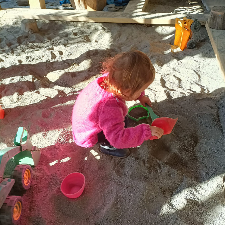 Playing in sandpit at Busy Bees Brookyln