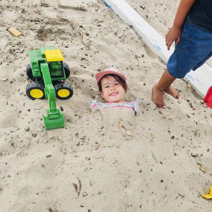 Busy Bees Coopers Beach playing at beach