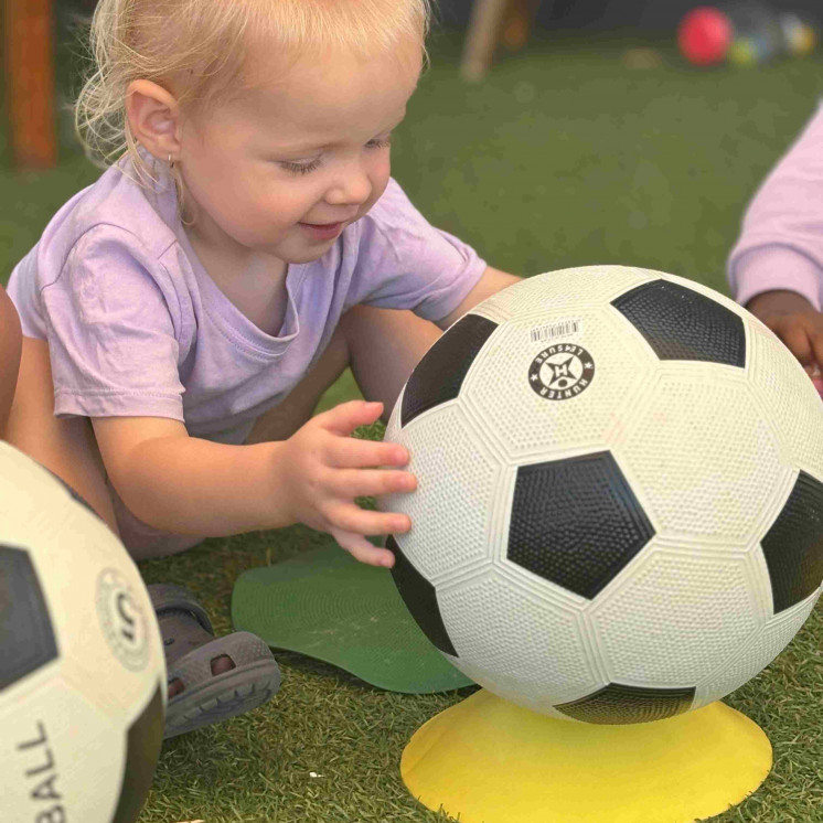 Babies playing sports in childcare centre - Busy Bees Hamilton East 