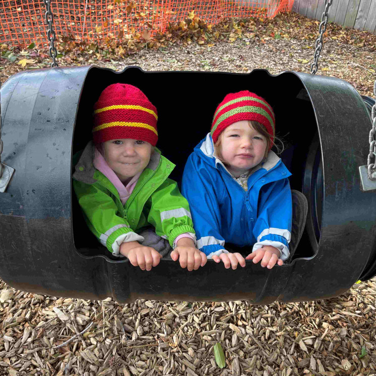 Preschoolers in fun swing at Busy Bees Katikati