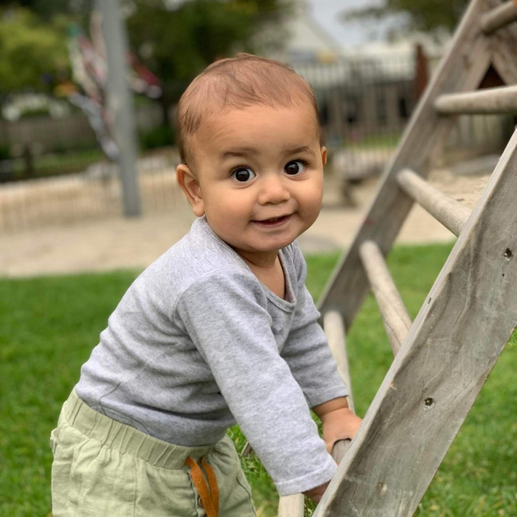 Infant climbing at Busy Bees Katikati