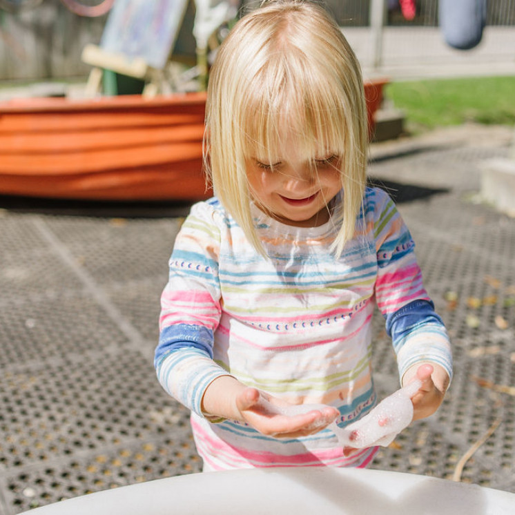 Babies and toddler bubble fun at Busy Bees Mapua