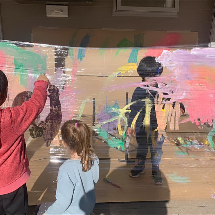 Little artists painting on different mediums at Busy Bees Hardy Street