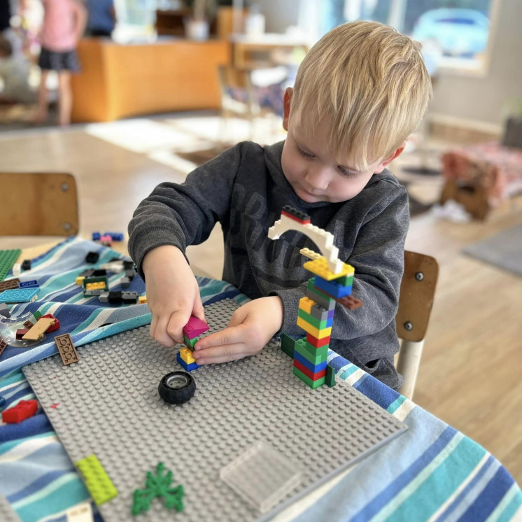Toddler learning fine motor skills at Busy Bees New Plymouth 