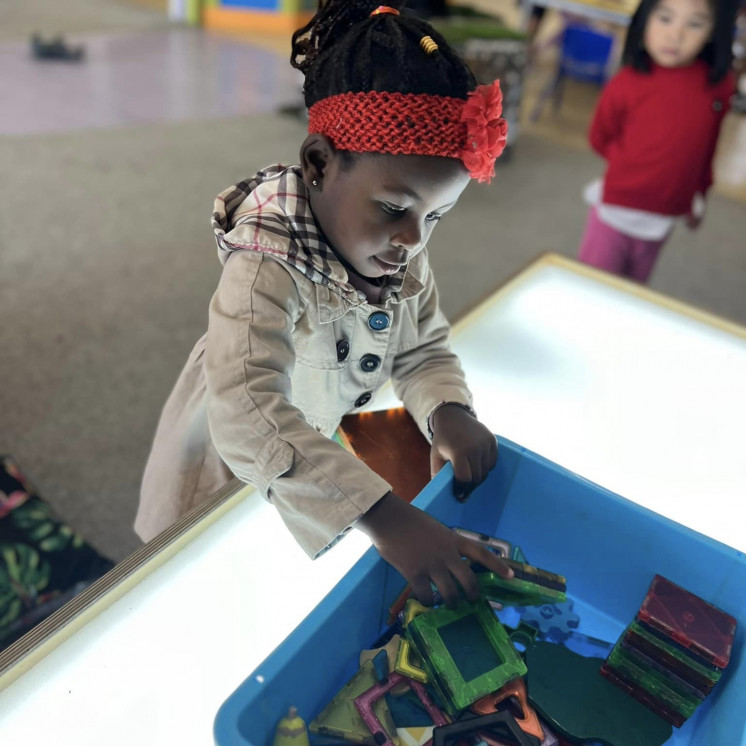 Exploring and creating with magnetic tiles at Busy Bees Ormiston Road