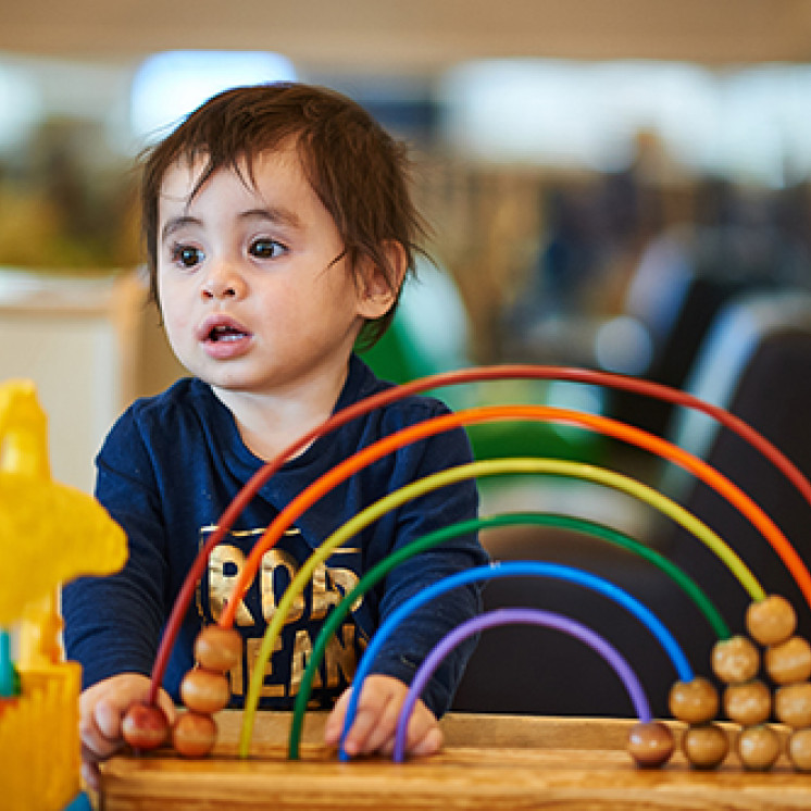 Child Playing with Resources at Busy Bees Pakuranga