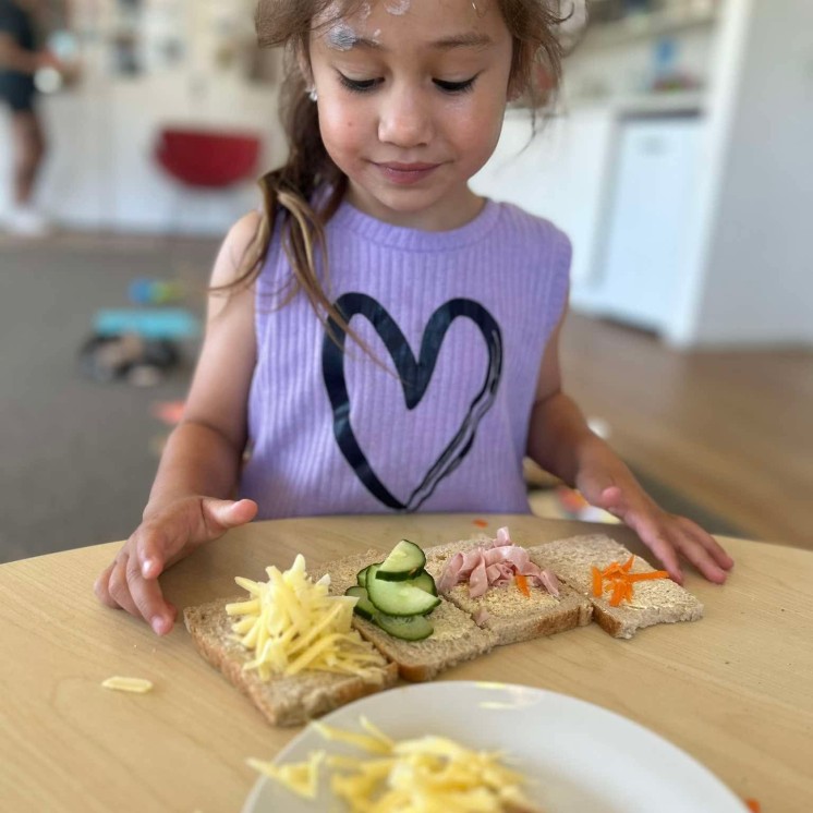 Making food to eat at Busy Bees Papamoa Beach