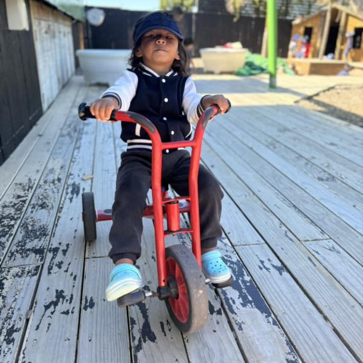 4 year old boy zooming around on the trike at Busy Bees Roscommon Road