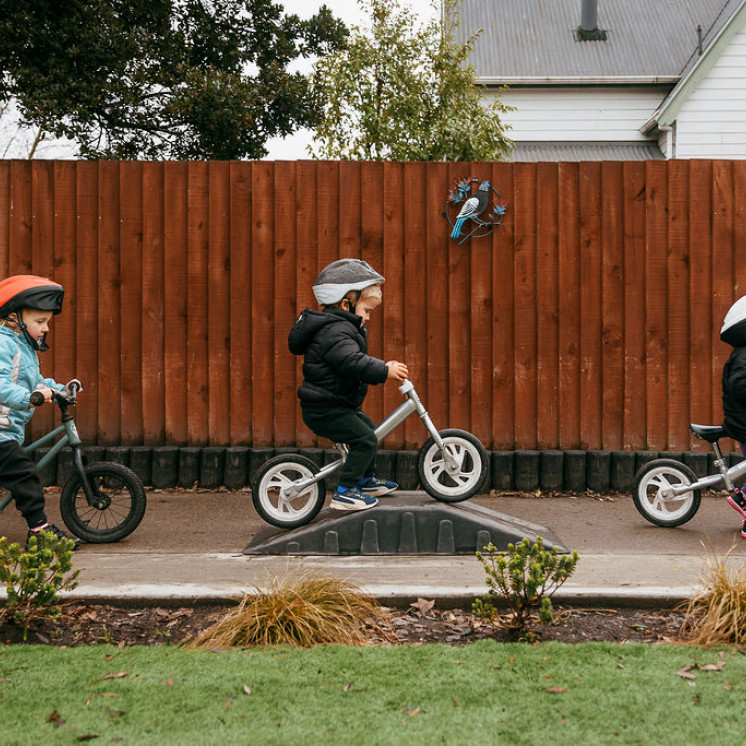 Kids riding their bikes through obstacles at Busy Bees Southbrook