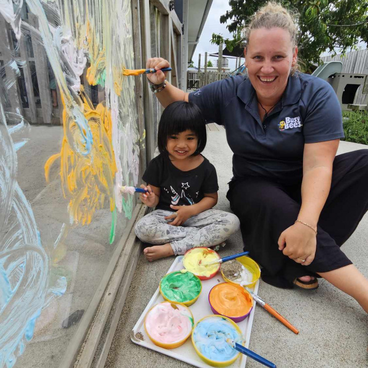Outdoor painting with toddlers at Busy Bees Te Kauwhata