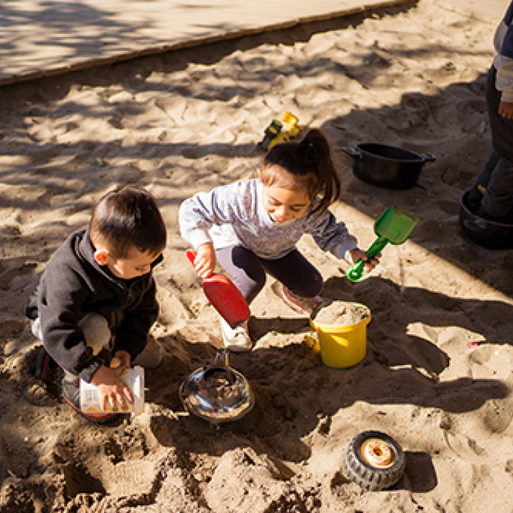 Digging in sand pit at Busy Bees Western Heights