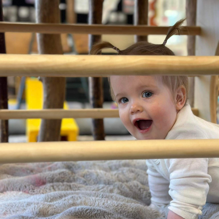 Busy Bees Whitby happy baby in nursery