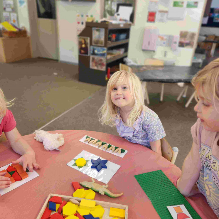 Indoor learning with puzzles in our preschool room at Busy Bees Hardy Street