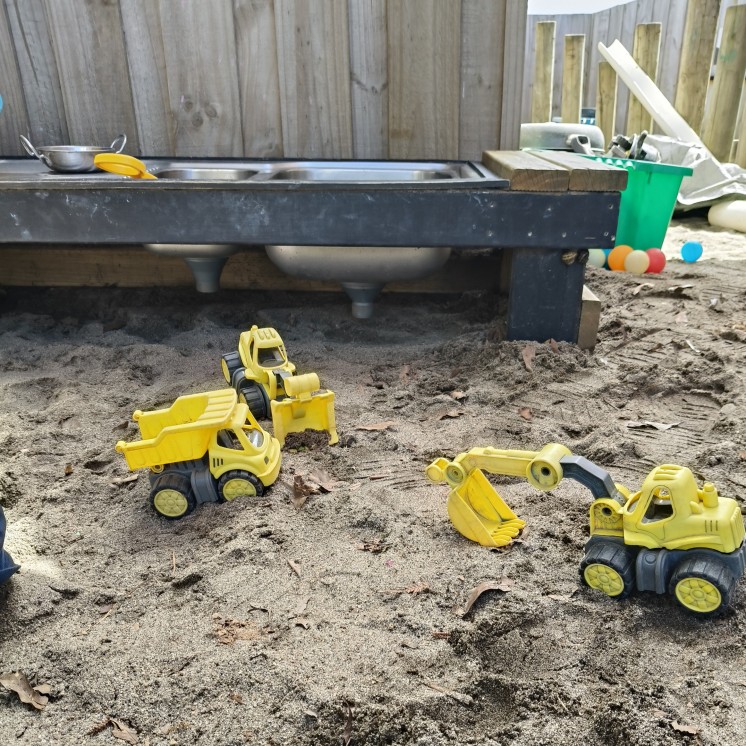 House of Wonder Forest Lake Sandpit with dump trucks and digger toys for development